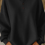 Katja - Lockerer Pullover mit Knopfleiste in Schwarz