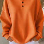 Katja - Lockerer Pullover mit Knopfleiste in Orange
