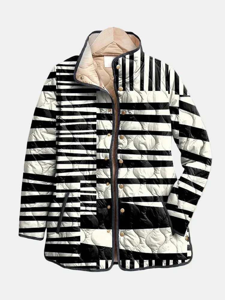 Moxanne - Gesteppte Jacke in Schwarz-Weiß mit abstraktem Muster